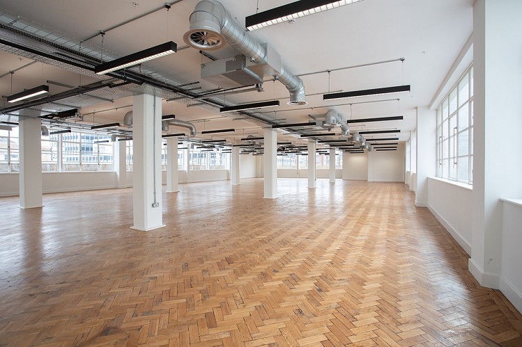 The huge open plan space has been stripped back and original features revealed