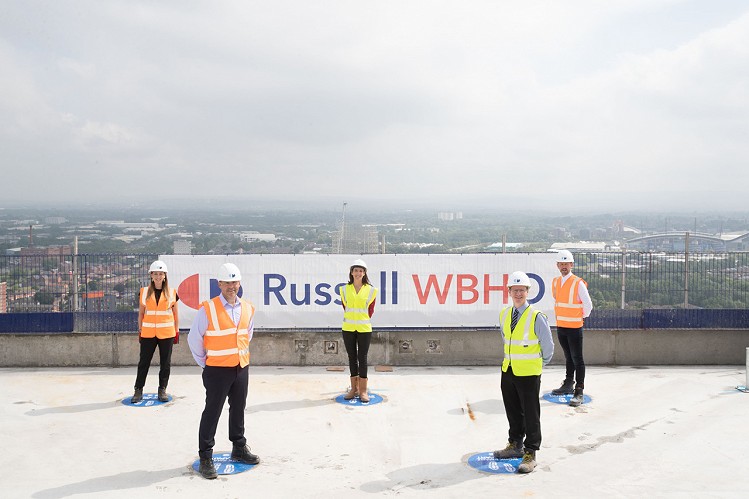 The Oxygen senior project team on the roof of the 32 storey tower