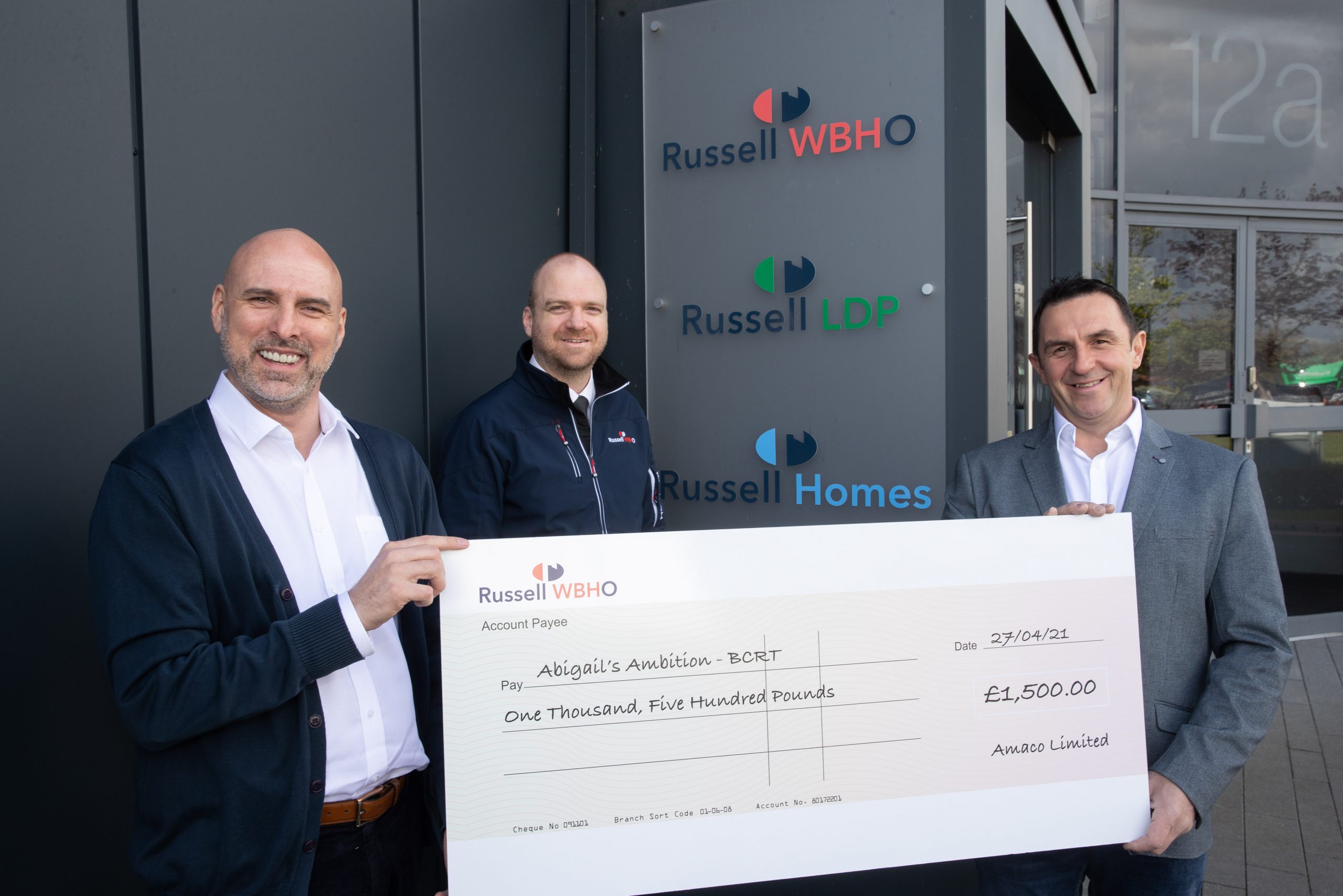 Amaco Vending directors present cheque to RussellWBHO